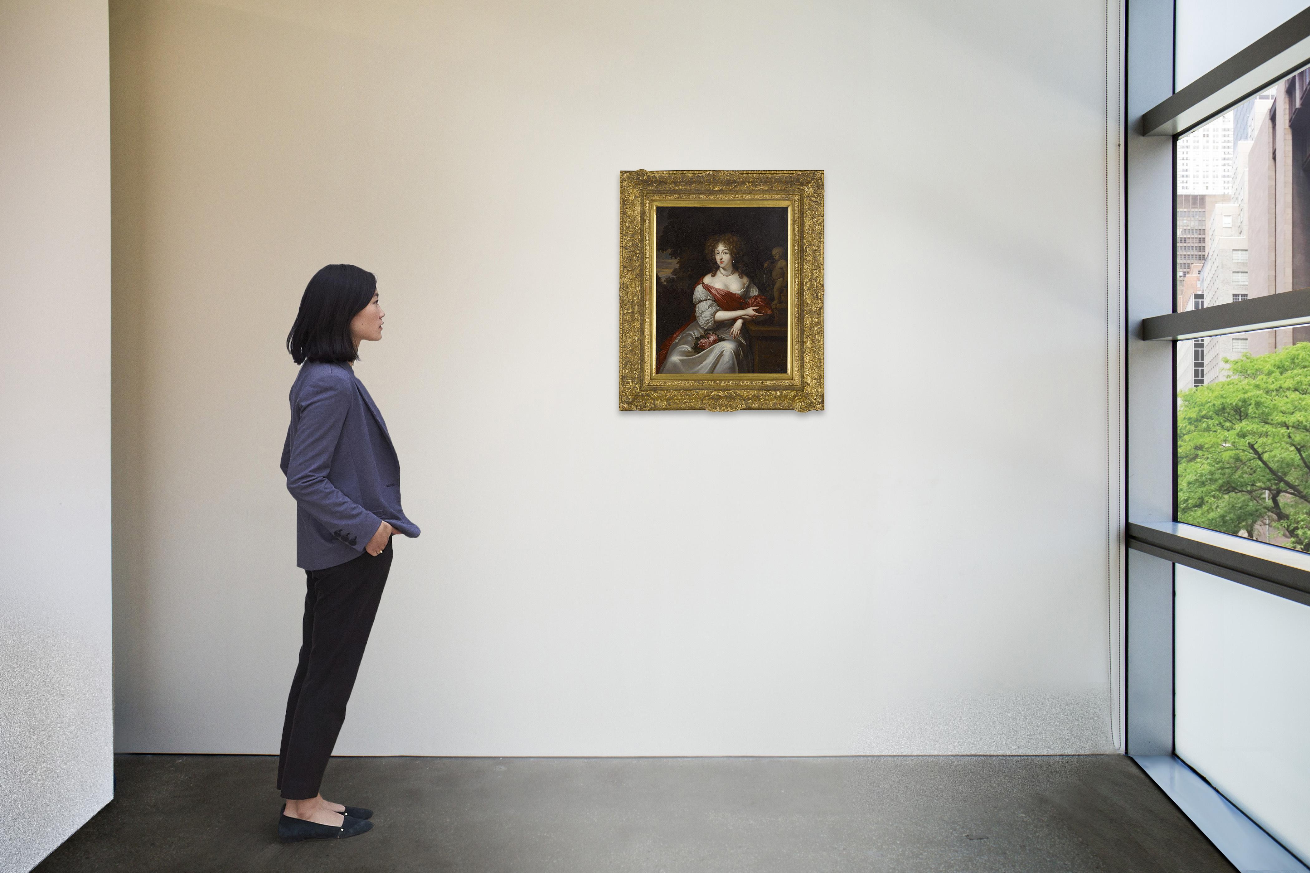 Jan Van Haensbergen - Portrait Of An Elegant Woman, Three-Quarter Length, Reclining Against A Fountain In A Garden