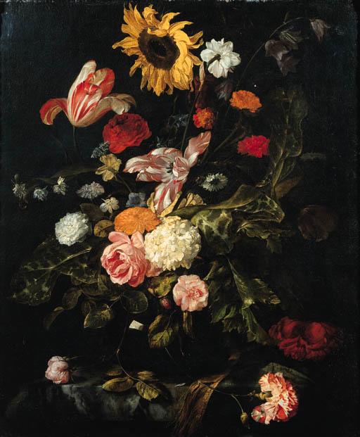 Jan Weenix - A sunflower, roses, parrot tulips, a carnation and other flowers in a glass vase on a partly draped marble table
