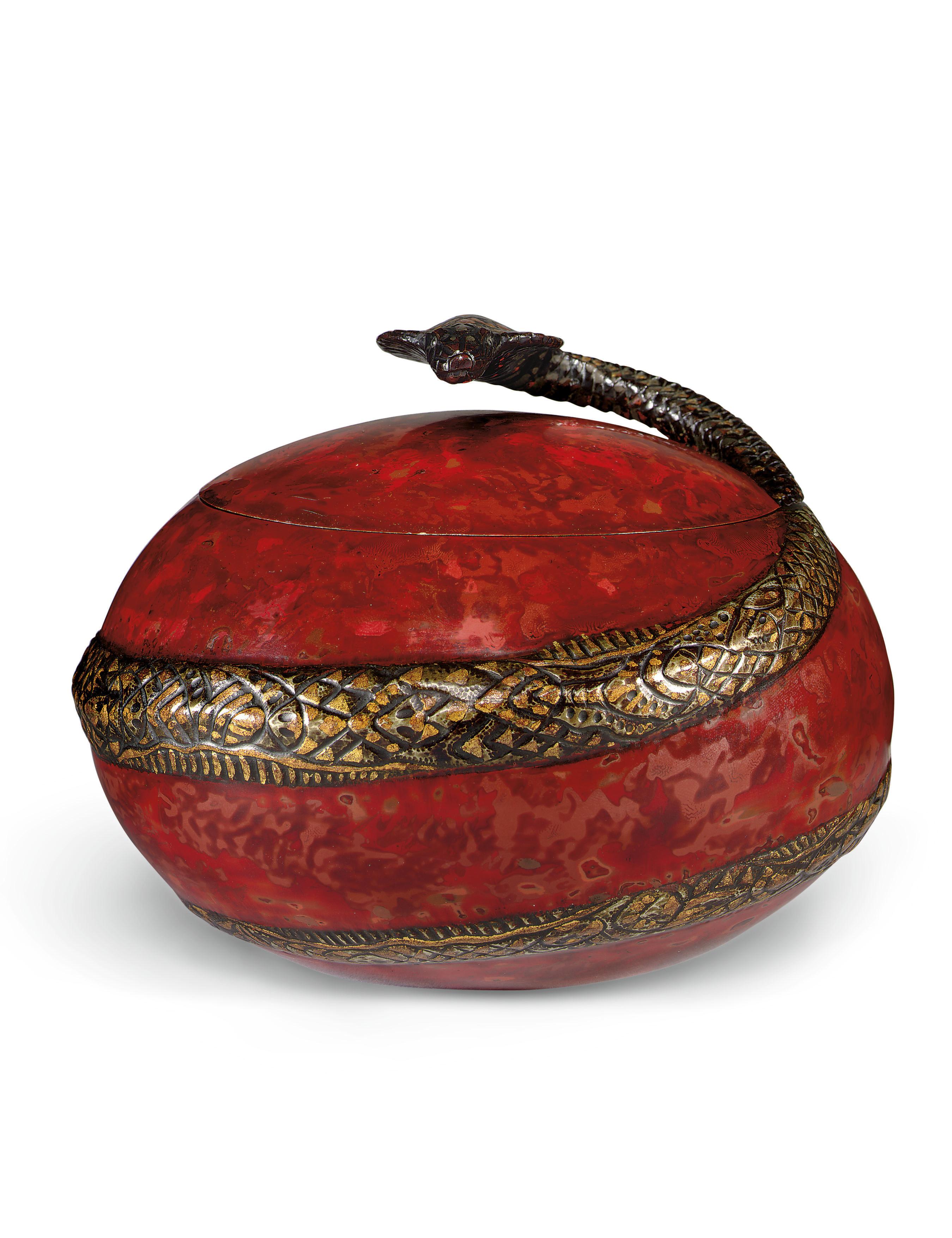 Jean Dunand - A LACQUERED METAL AND GILT-BRONZE \'COBRA\' BONBONNIÈRE, CIRCA 1925