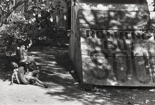 Jill Freedman - Untitled (Boys playing with tire, \