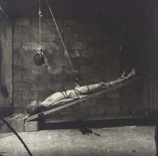 Joel-Peter Witkin - Testicle Stretched with Possibility of a Crushed Face, New York, 1982