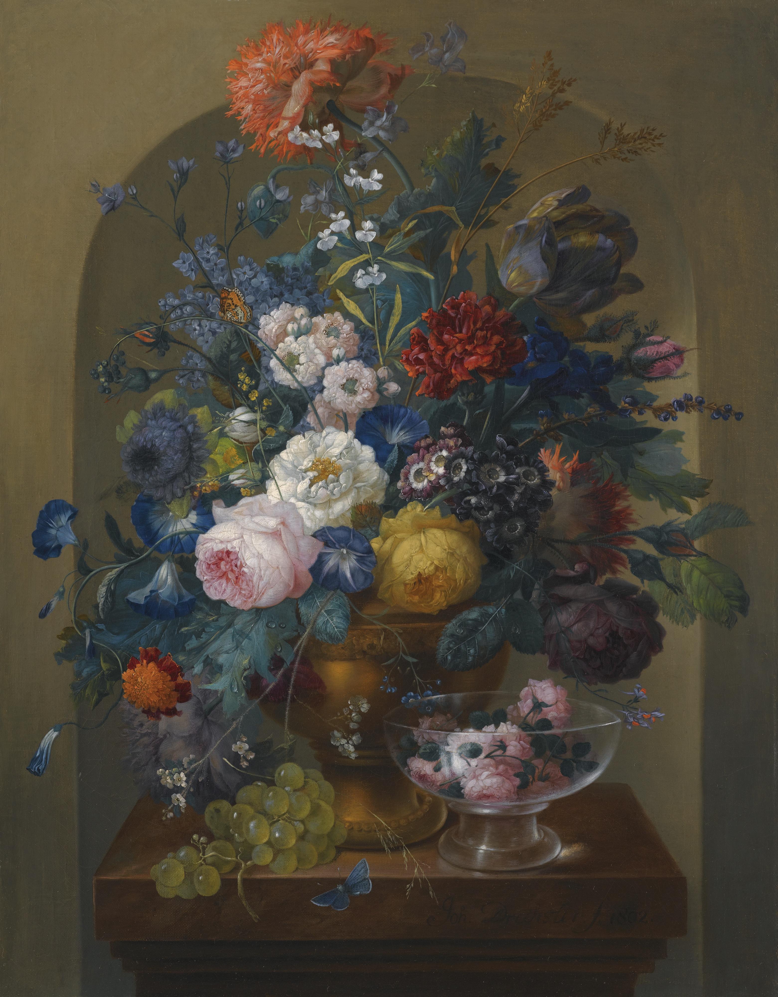 Johann Baptist Drechsler - Still Life Of Flowers In An Urn Togther With Cut Roses In A Glass Vase Upon A Table In A Niche