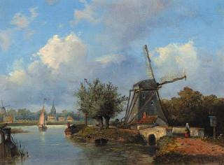Johannes Josephus Destree - A windmill along a canal with a town in the distance