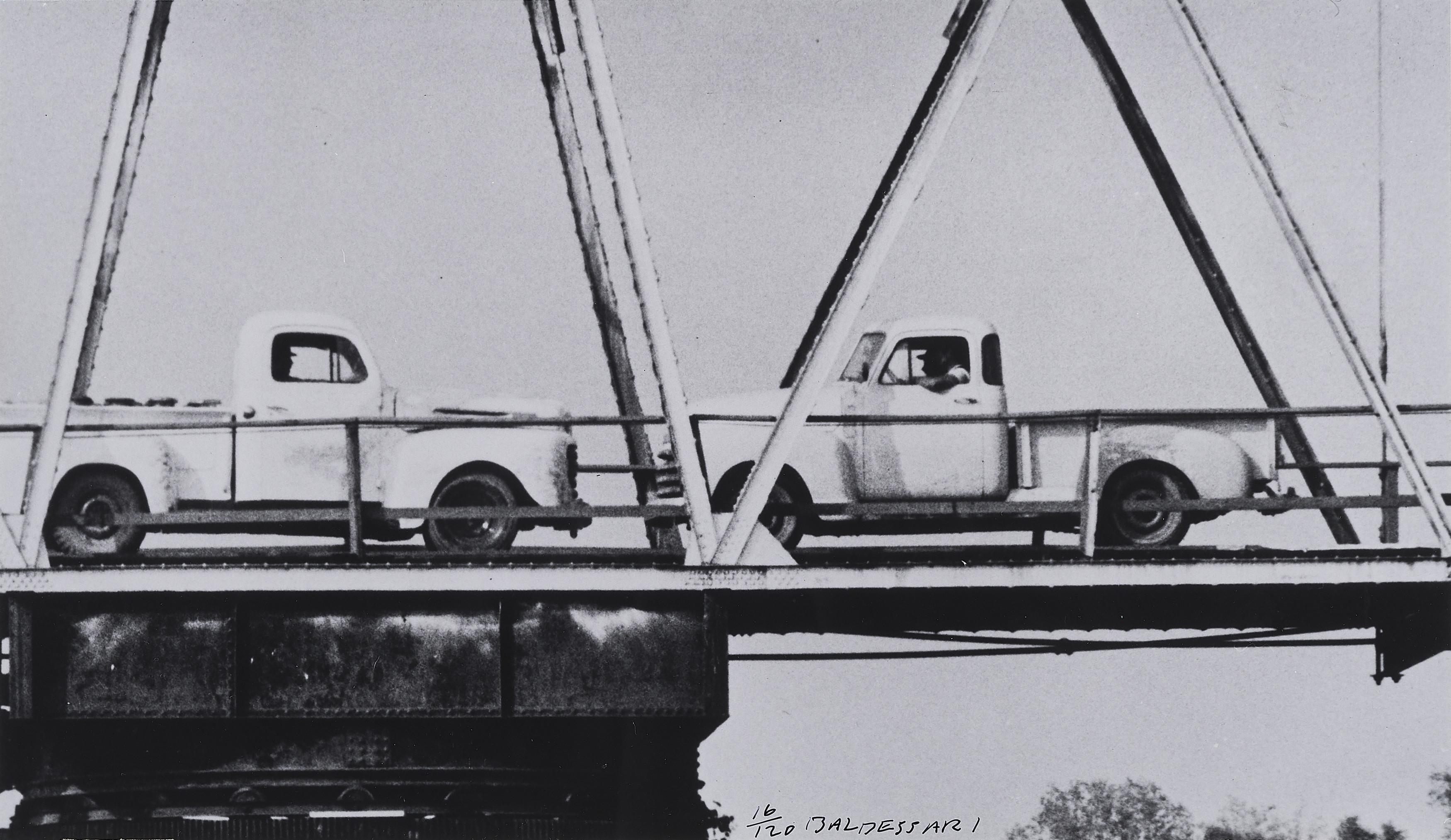 John Baldessari - Two Trucks / two Decisions (on Bridge).