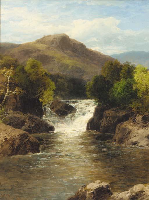 John Brandon Smith - A waterfall in a rocky gorge