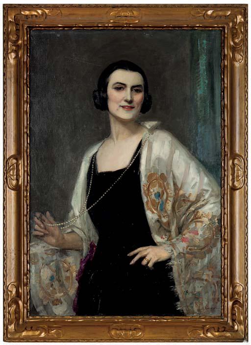 John Henry Amshewitz, R.B.A. - Portrait of Sarah Briana Amshewitz, the artist\'s wife, standing half-length, in a black dress with a white shawl and a pearl necklace