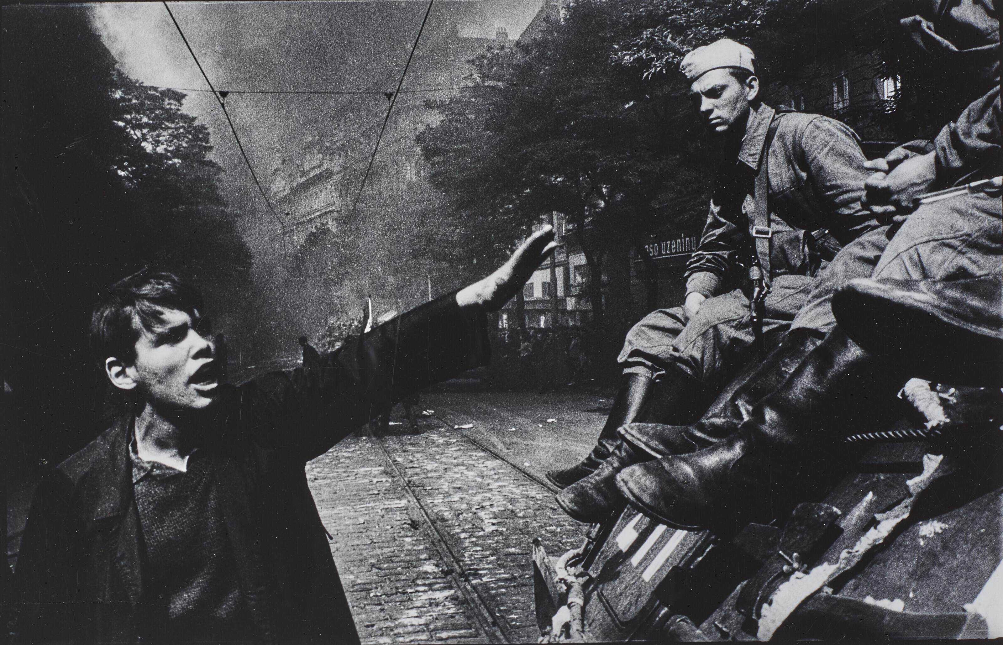 Josef Koudelka - Invasion by Warsaw Pact Troops in front of the Radio Headquarters, Prague, 1968