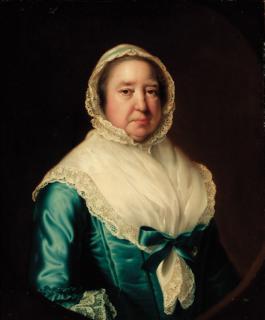 Joseph Wright of Derby, A.R.A. - Portrait of Mrs. Fowler, half-length, in a blue dress, with a white shawl and bonnet, feigned oval