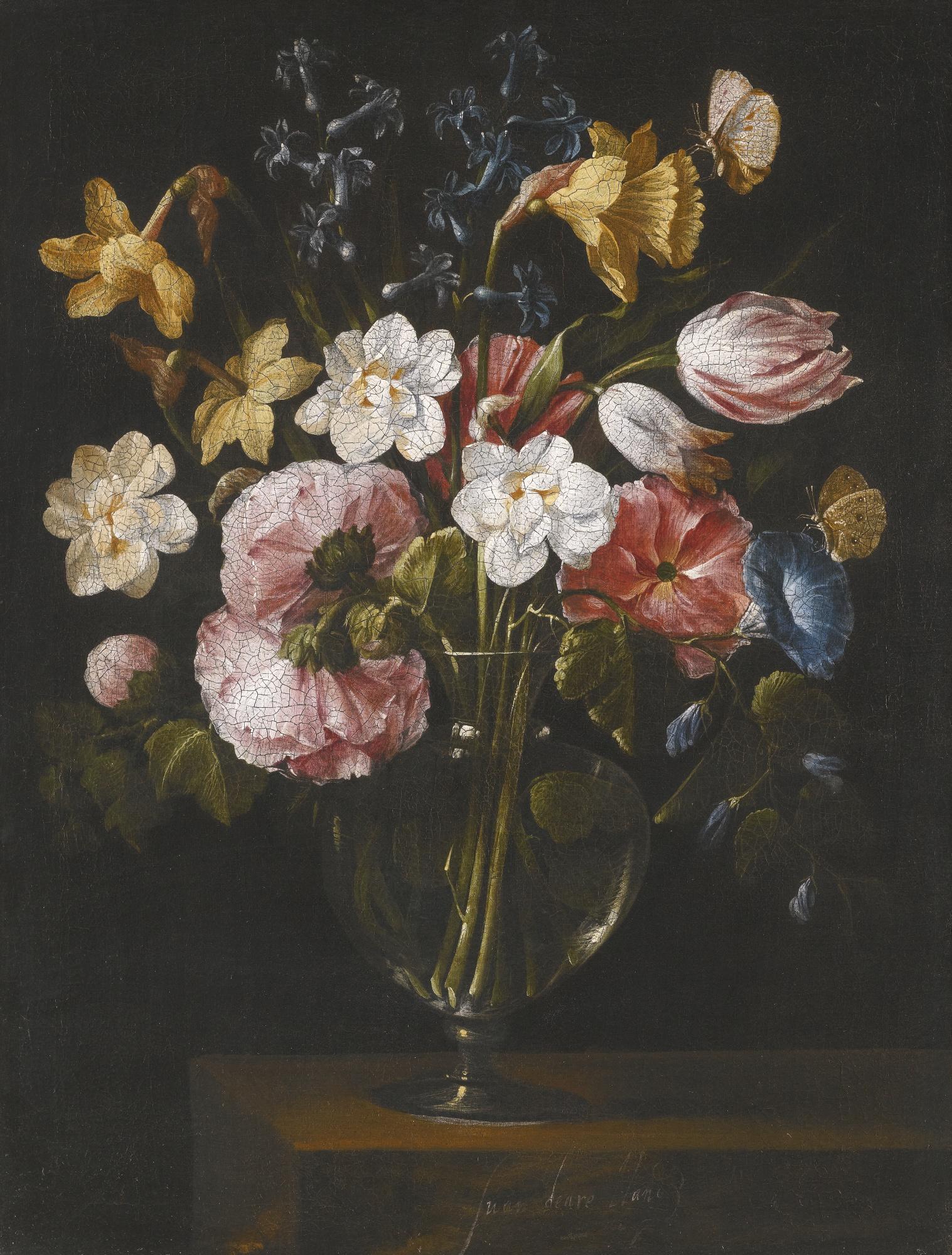 Juan De Arellano - A Still Life Of Narcissi, Daffodils, Tulips, Hollyhocks, Hyacinths And Other Flowers In A Glass Vase On A Stone Ledge, With Butterflies