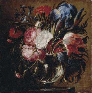 Juan de Arellano - A tulip, carnations, roses, irises, bluebells and other flowers in a glass vase on a ledge