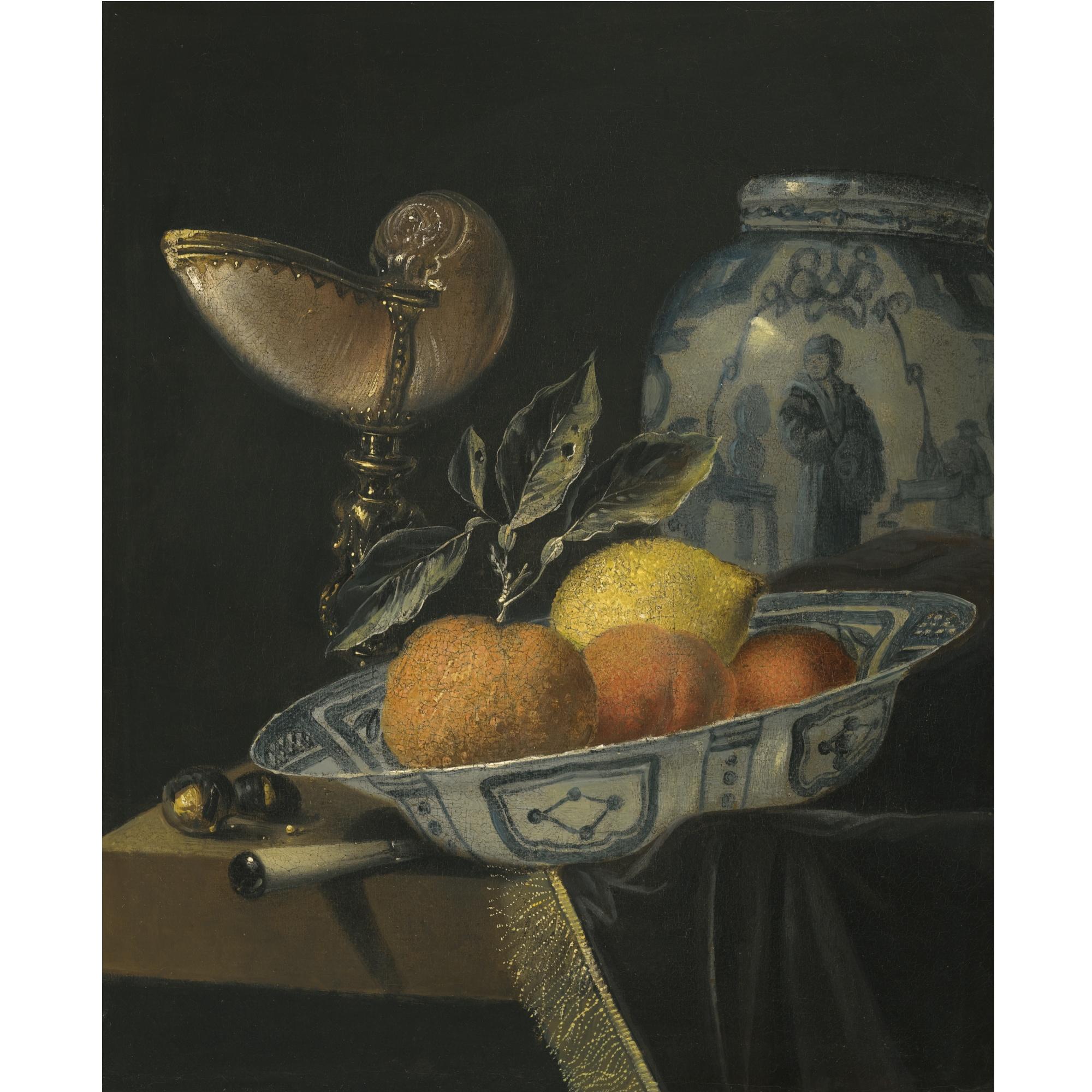 Juriaan Van Streek - A Still Life Of An Orange, A Lemon And Two Peaches In A Wan-Li Porcelain Bowl On A Table With A Fringed Carpet And A Nautilus Cup