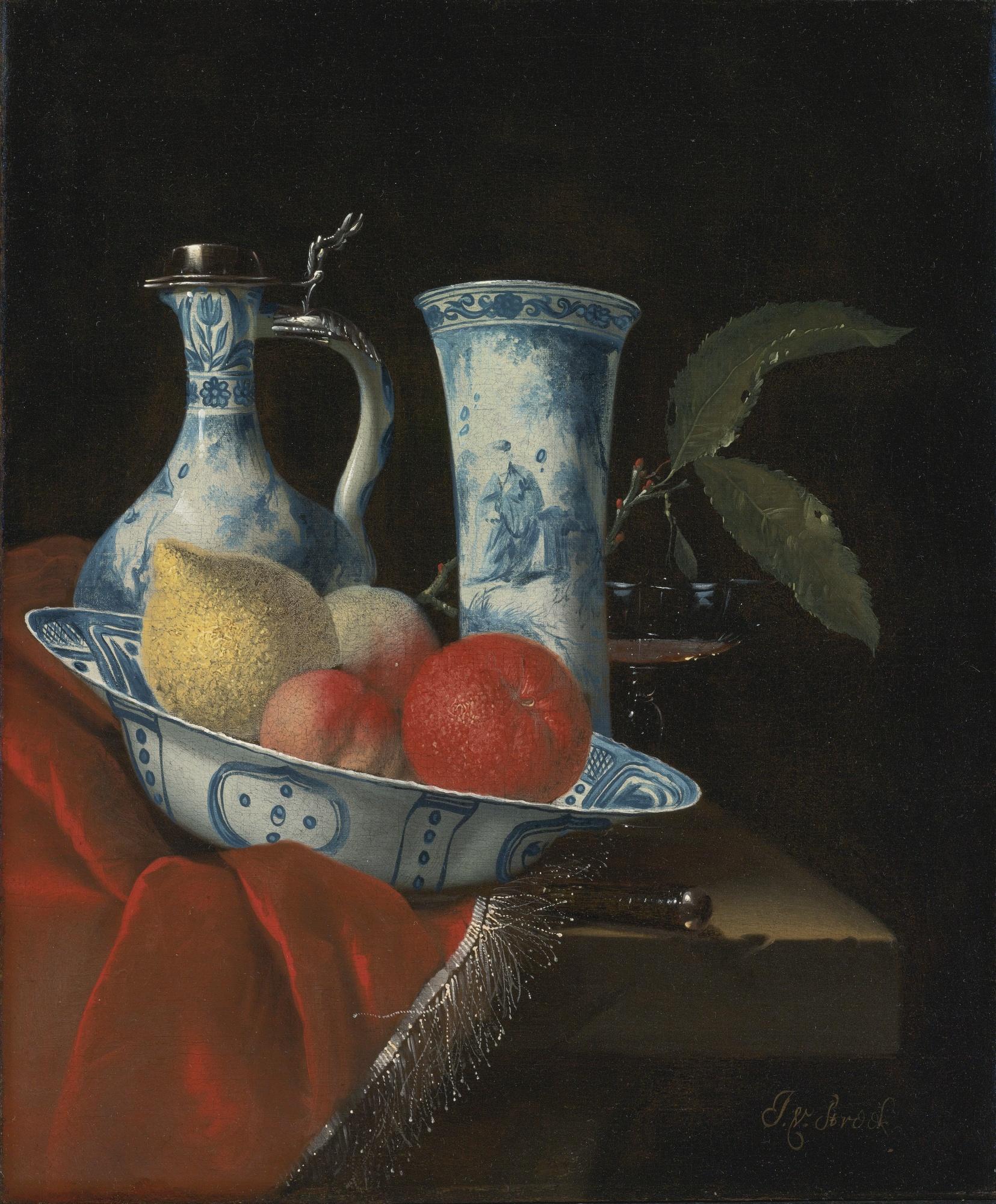 Juriaan Van Streek - Still Life Of A Blue And White Wan-Li Bowl With Peaches, A Lemon And An Orange, A Porcelain Ewer And Vase, A Wine Glass And A Knife, On A Partly Draped Stone Ledge