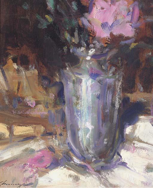 Ken Moroney - A vase of flowers on a table