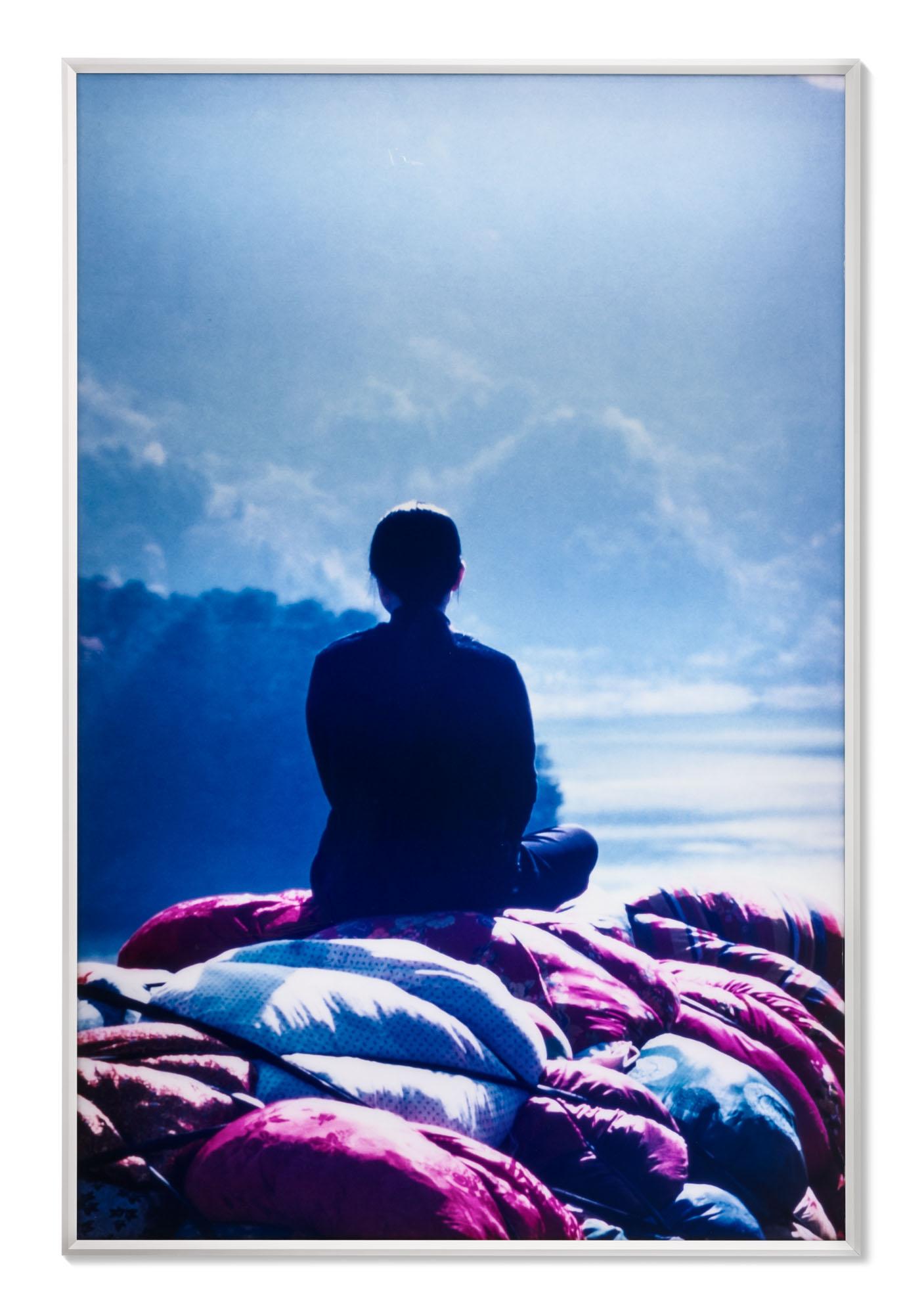 Kimsooja - Cities on the Move - 2727km Bottari Truck (Artist Facing Mountain)