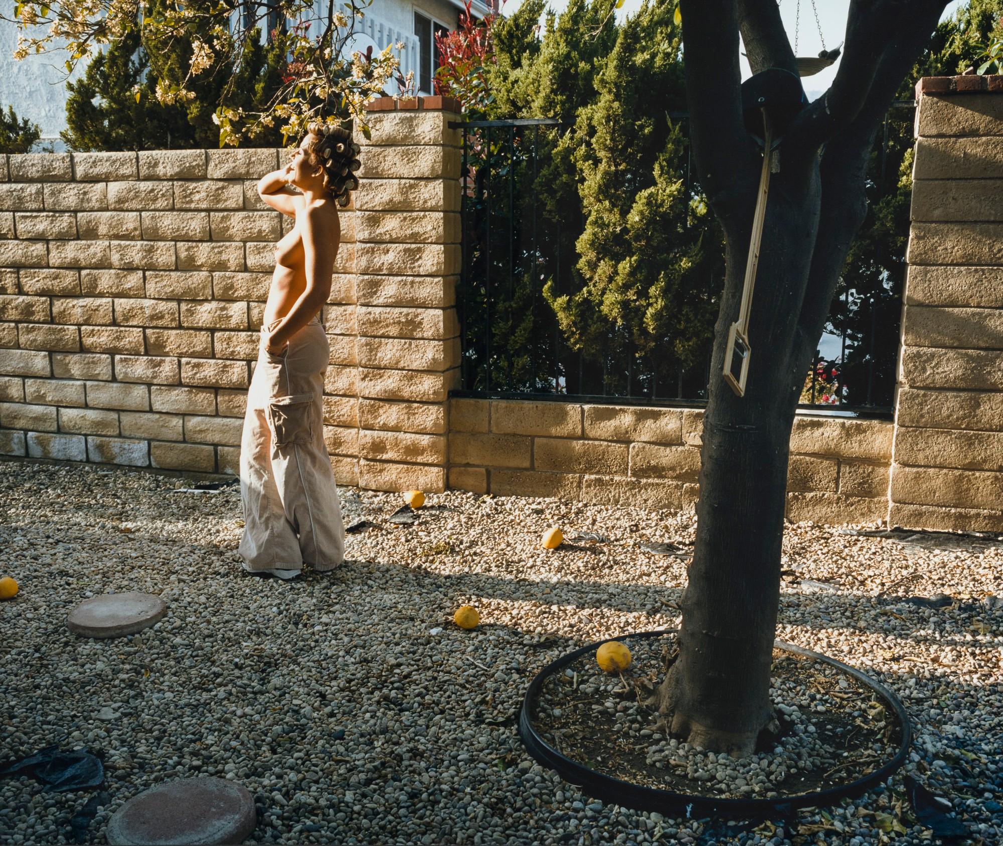 Larry Sultan - Woman In Garden, Mission Hills, 1999
