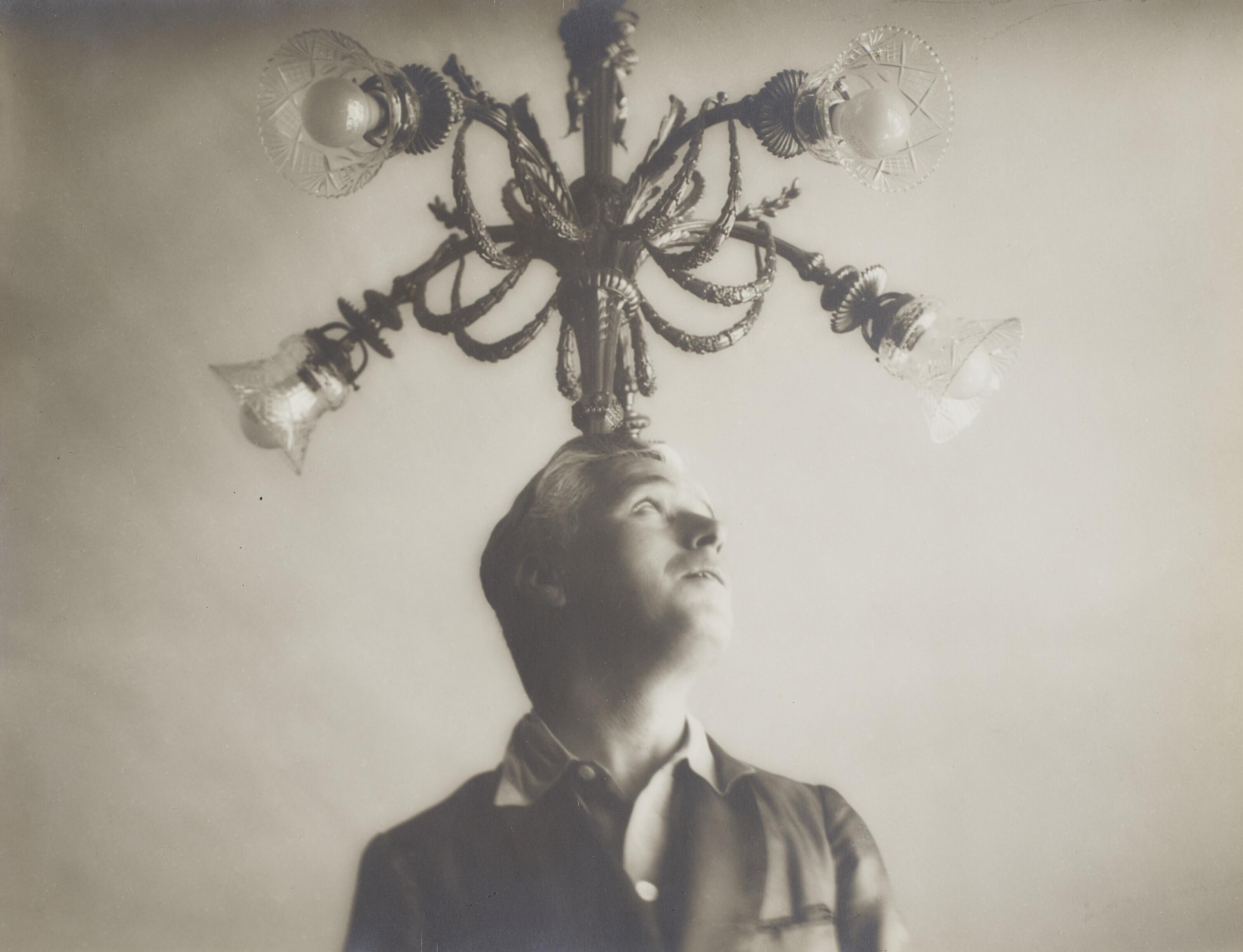 Lee Miller - Charlie Chaplin with Chandelier, Paris, France, 1931