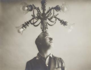 Lee Miller - Charlie Chaplin with Chandelier, Paris, France, 1931