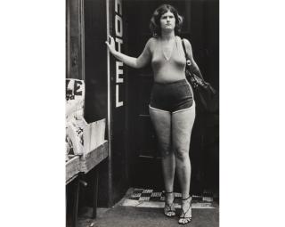 Leon Levinstein - NYC [woman in hotel entry]