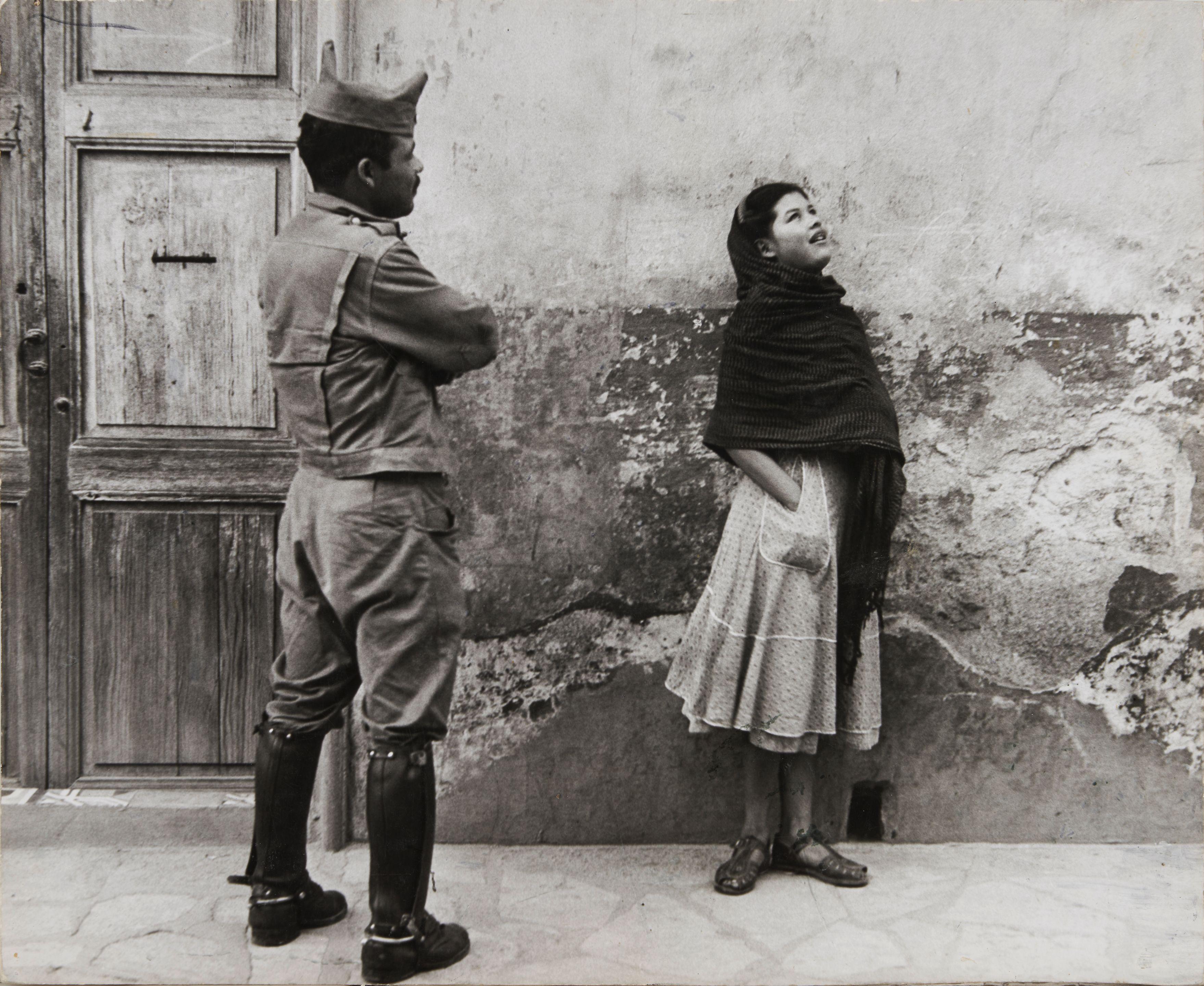 Leon Levinstein - Untitled, Mexico [woman and man in uniform]