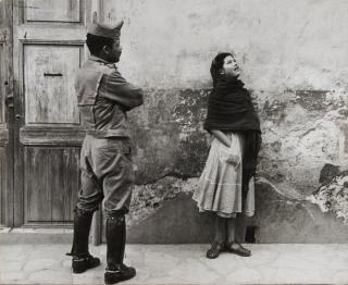 Leon Levinstein - Untitled, Mexico [woman and man in uniform]