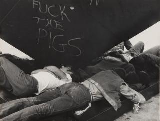Leon Levinstein - Untitled [teenagers lying on Alamo, Astor Place]