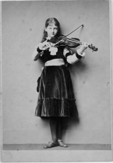 Lewis Carroll - Xie with violin, 1876