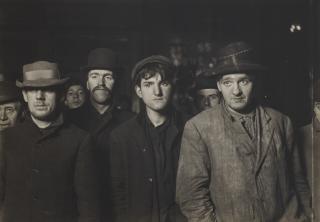 Lewis Wickes Hine - Four men with hats, c. 1909