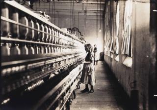Lewis Wickes Hine - Girl working in a Carolina cotton mill, 1908