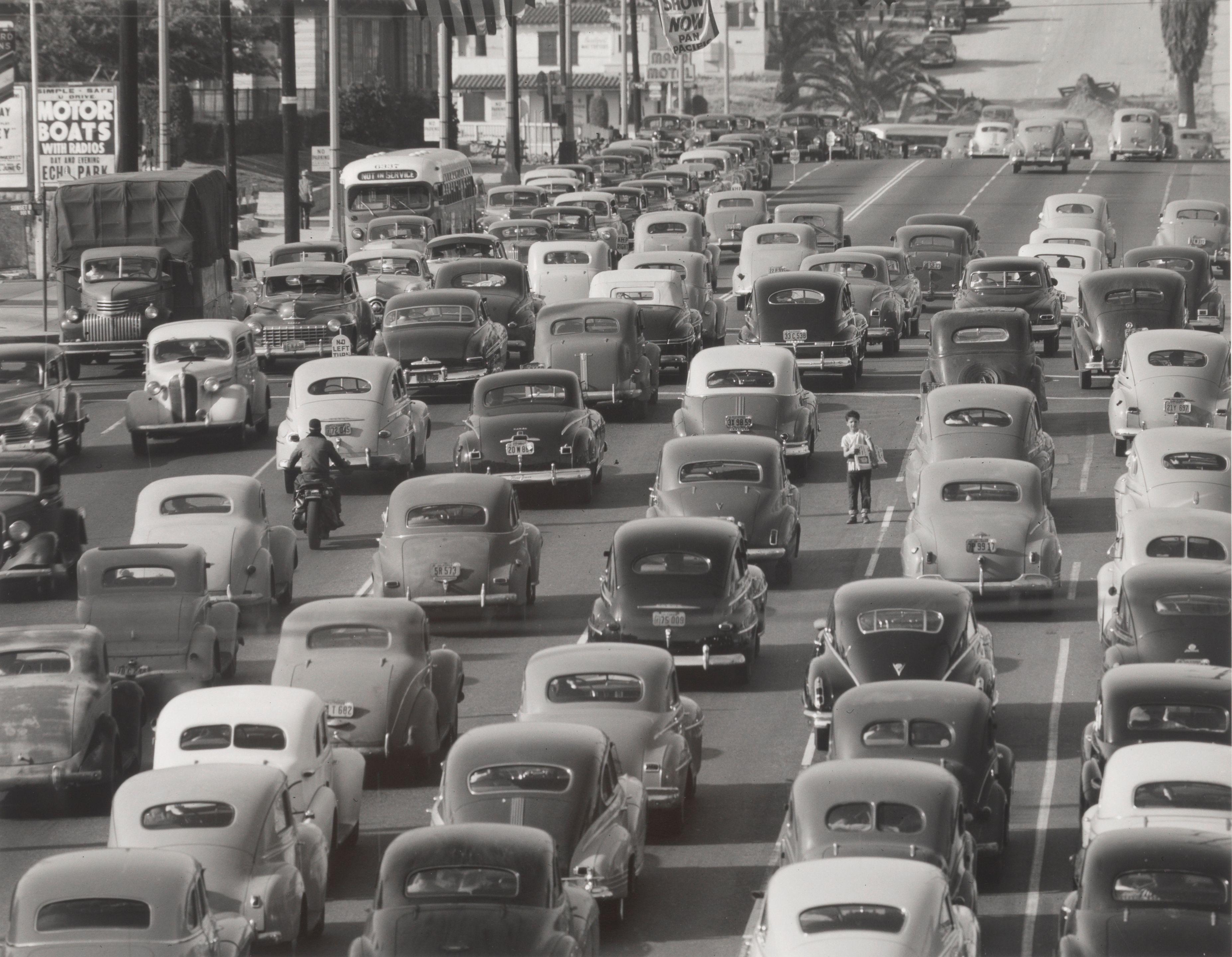 Loomis Dean - Boy Selling Newspapers, Los Angeles, Looking South on Olive Street