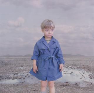 Loretta Lux - Boy In A Blue Raincoat 1