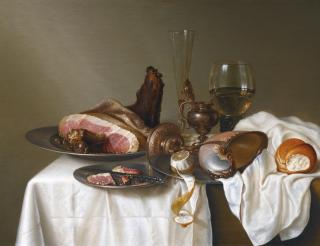 Maerten Boelema De Stomme - Still Life With A Ham, A Glass And A Nautilus Cup On A Table Draped With A White Cloth