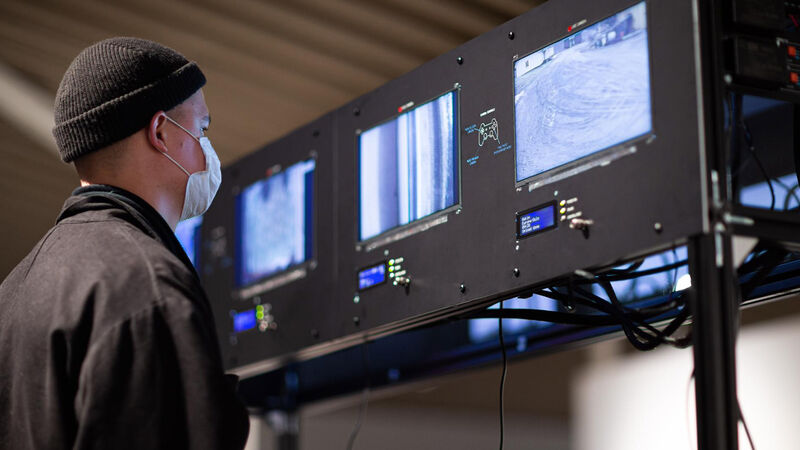A Person looking at different running screens