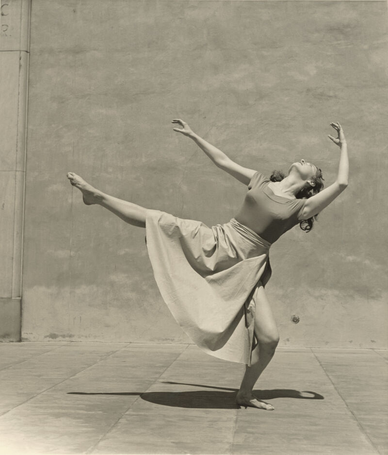 Black and white photograph of a dancer doing a pose