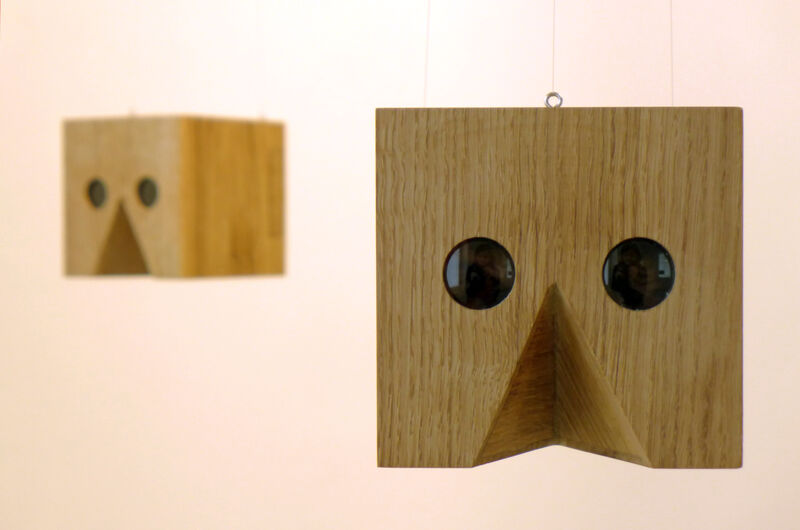 Photograph of a hanging wodden installation