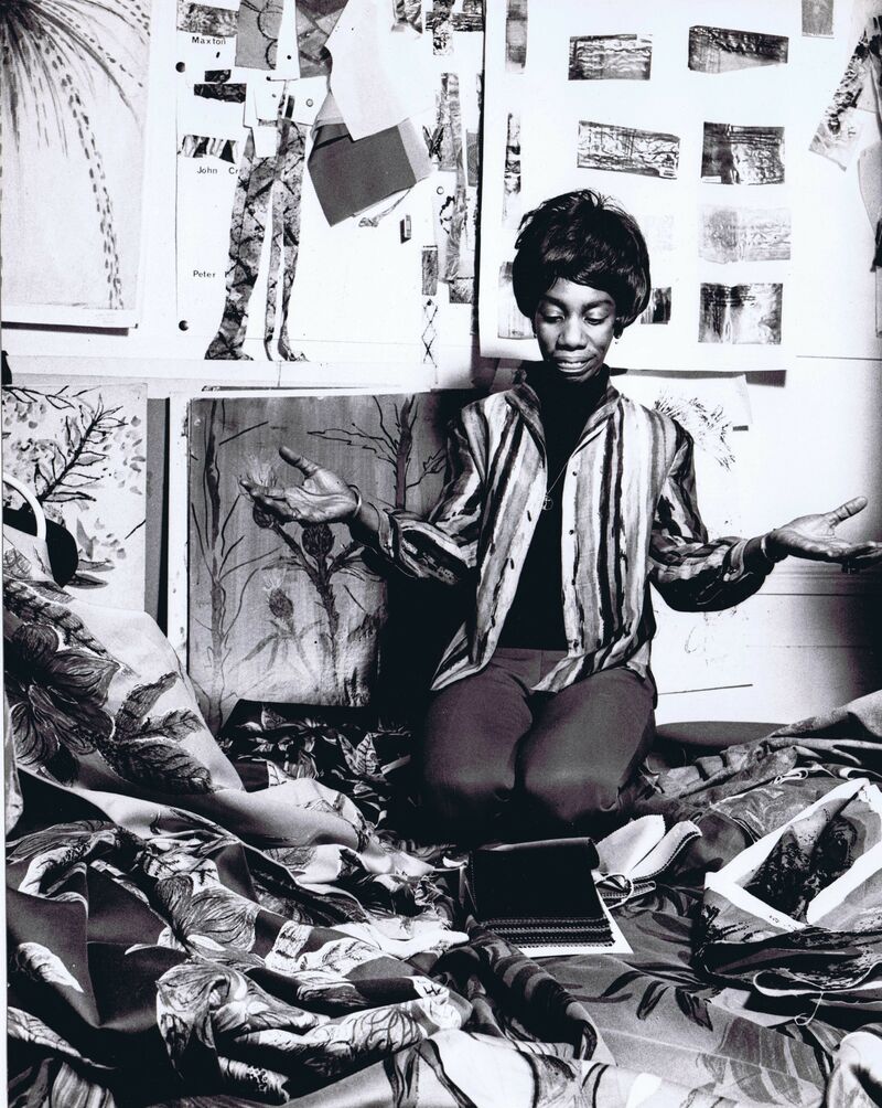 Althea McNish in her studio, c.1970, shown wearing a shirt made of Bezique