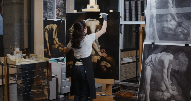 Image of the restoration process of the David with the Head of Goliath by Caravaggio.