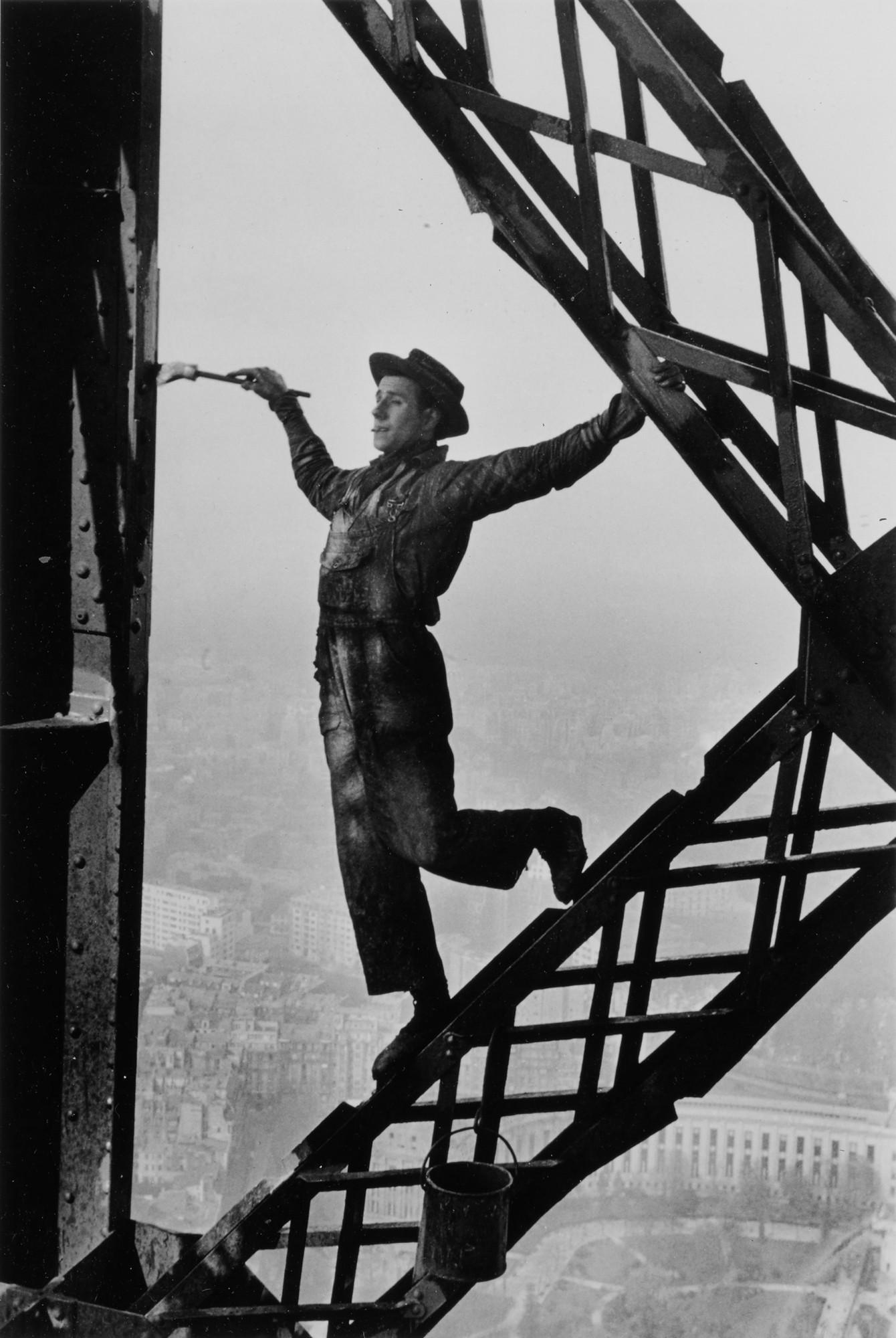 Marc Riboud - \'Painter on the Eiffel [Tower], Paris\'