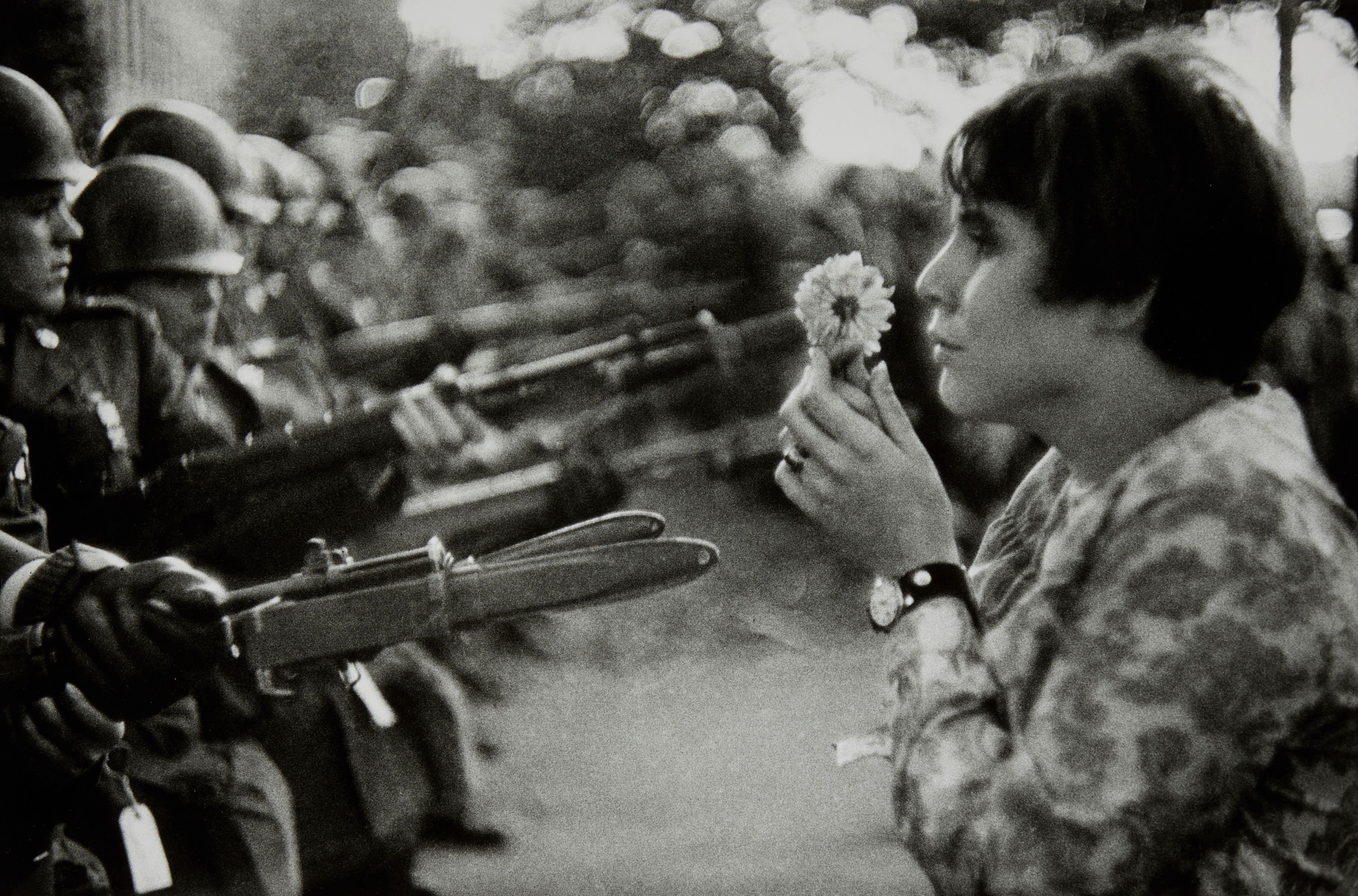 Marc Riboud - Young Girl with Flower in Demonstration against War in Vietnam, Washington, D.C.