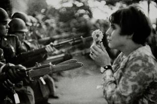 Marc Riboud - Young Girl with Flower in Demonstration against War in Vietnam, Washington, D.C.