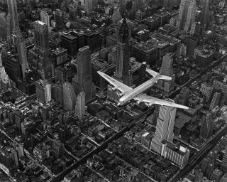 Margaret Bourke-White - A Dc-4 Flying Over New York City
