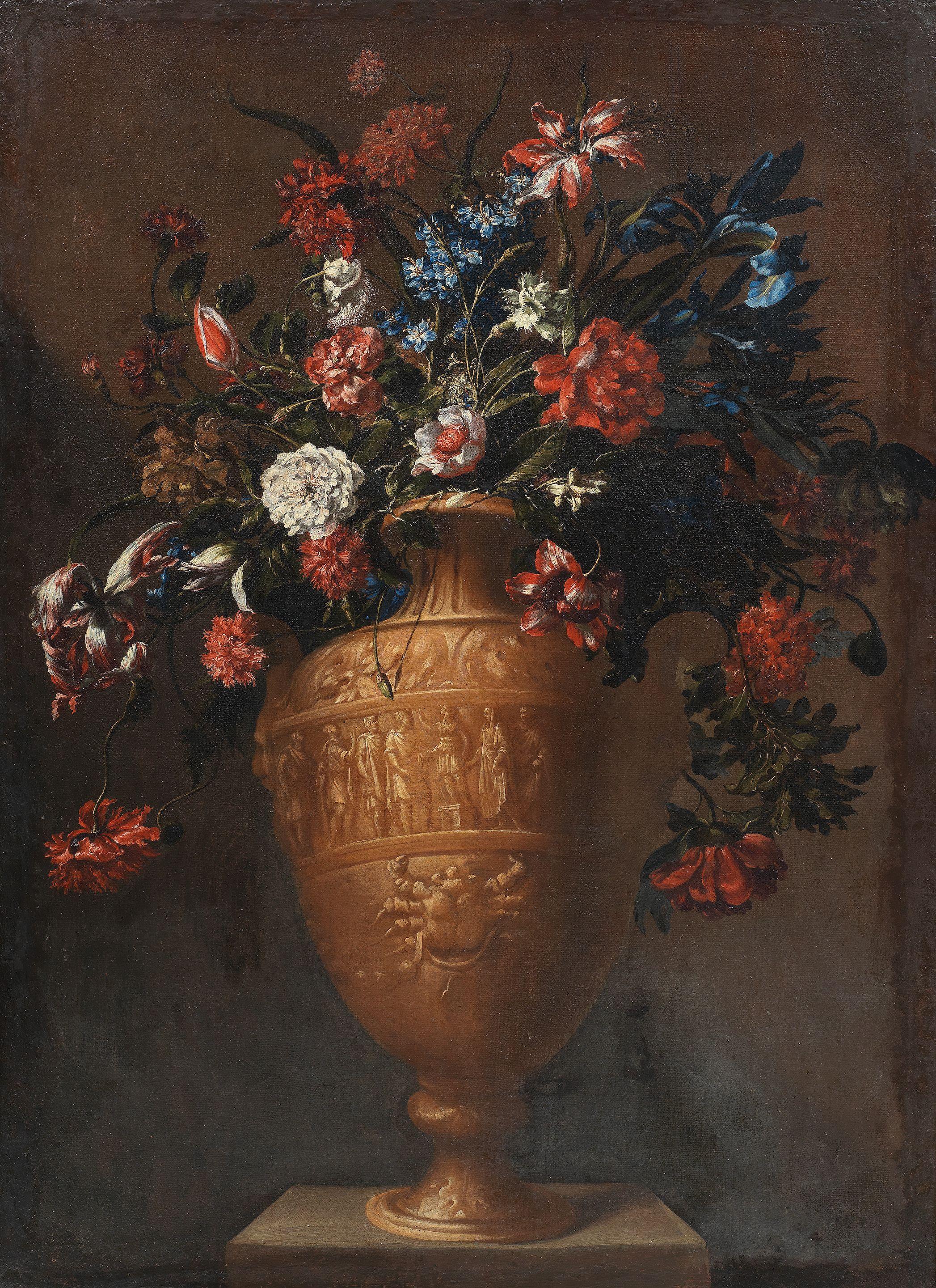 Mario Nuzzi - A still life of chrysanthemums, irises, tulips and other flowers in a bronze urn