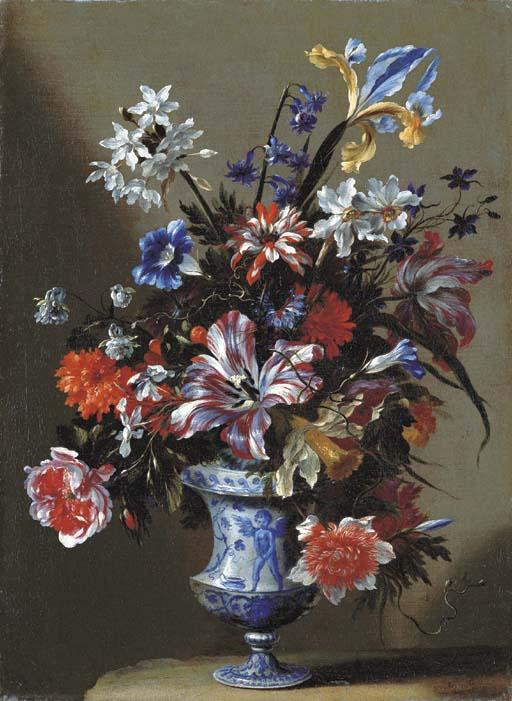 Mario Nuzzi - Lilies, Peonies, Narcissi, Morning Glory And Other Flowers In A Blue And White Vase On A Stone Ledge