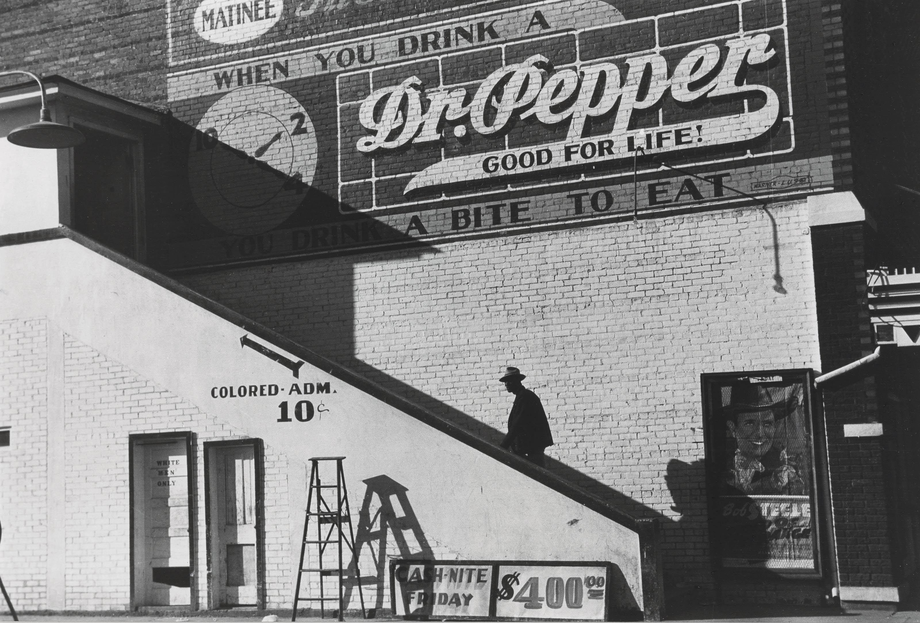 Marion Post Wolcott - Negro Man Climbing The Stairs To The Movie Theater, Belzoni, Miss., 1939