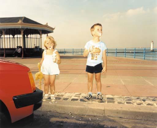 Martin Parr - New Brighton (Boy and girl eating ice-cream)
