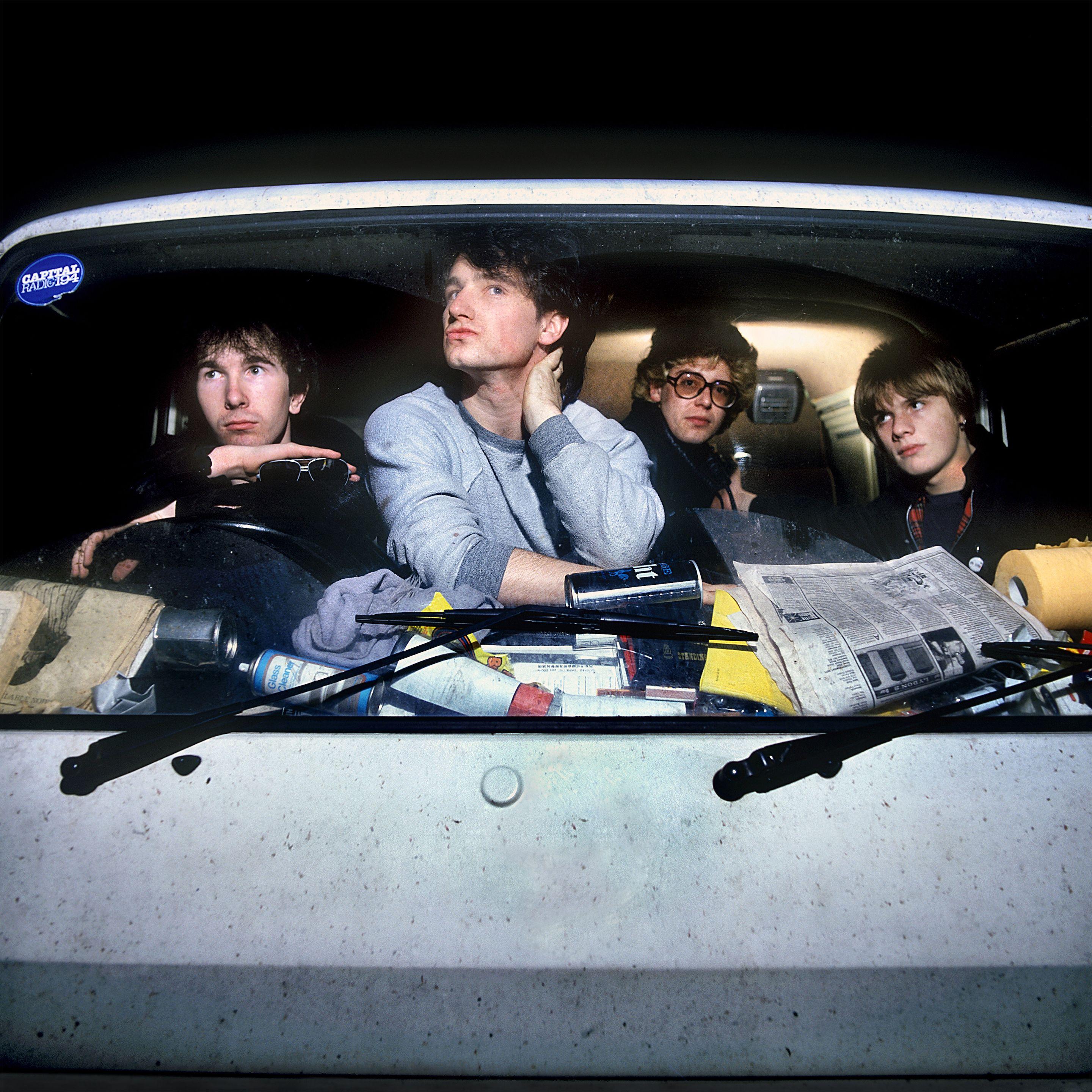 Martyn Goddard - U2 in their VW tour van, 1980, printed later