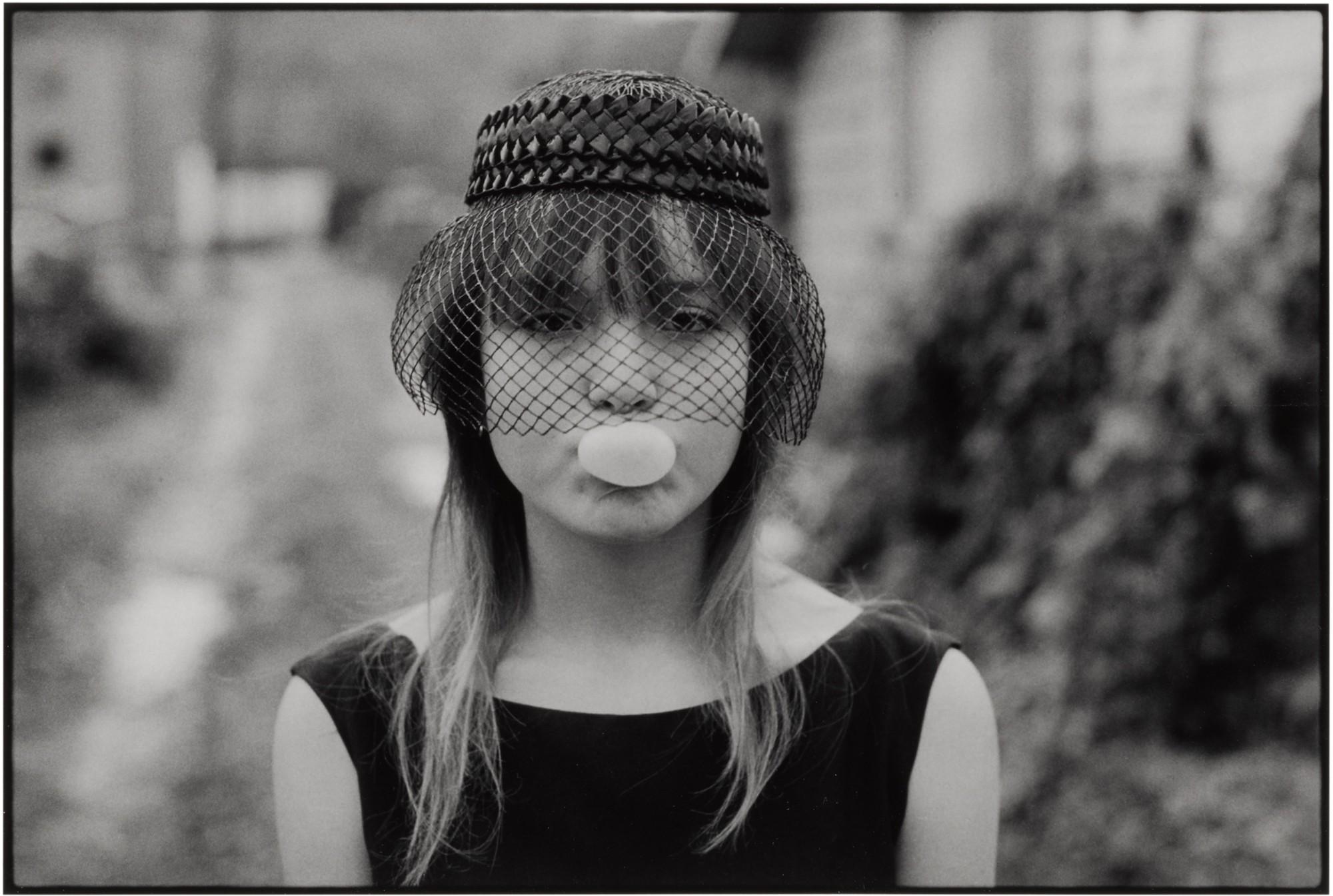 Mary Ellen Mark - Tiny Blowing a Bubble, Seattle (from Streetwise)