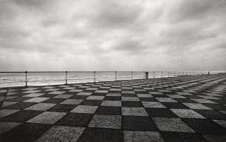 Michael Kenna - Sea Front, Hastings, England; Curraghs, Ireland; Vaux-le-Vicomte, France