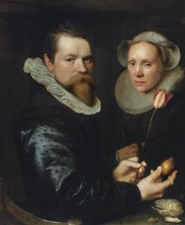 Michiel Jansz. Van Mierevelt - Double Portrait Of A Husband And Wife, He Holding A Tulip And Bulb, A Selection Of Shells On The Shelf Below