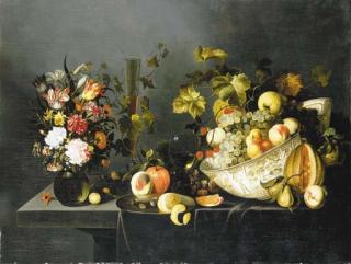 Michiel Simons - Tulips, carnations and other flowers in a vase, grapes and peaches in a porcelain bowl, with glasses of wine, a peeled lemon on a dish and other fruit on a partially draped stone ledge