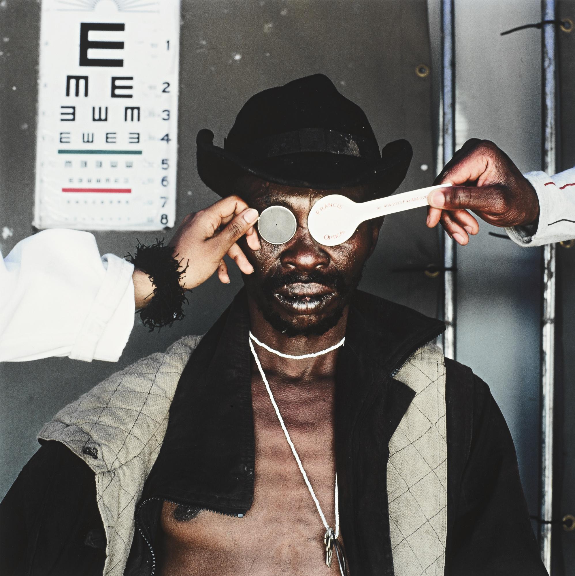 Mikhael Subotzky - Joseph Dlamini (Eye Test), Matsho Tsmombeni Squatter Camp, South Africa